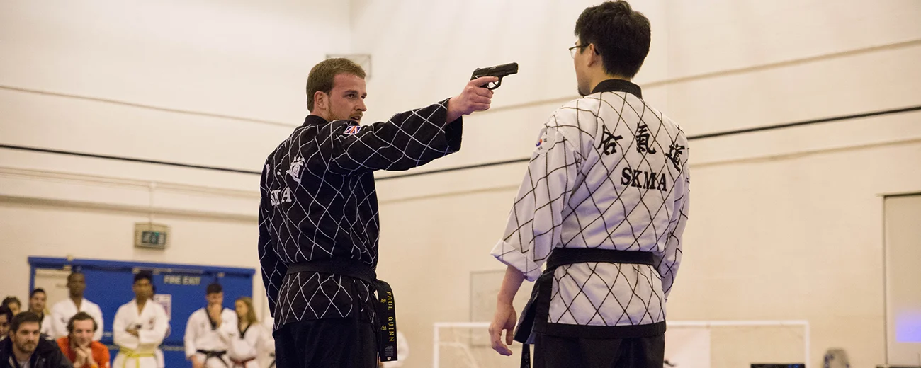 Master Sung showing how to disarm a gun at a London Hapkido Demonstration